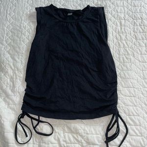 Two crop tops. 1 in black. And 1 in white.